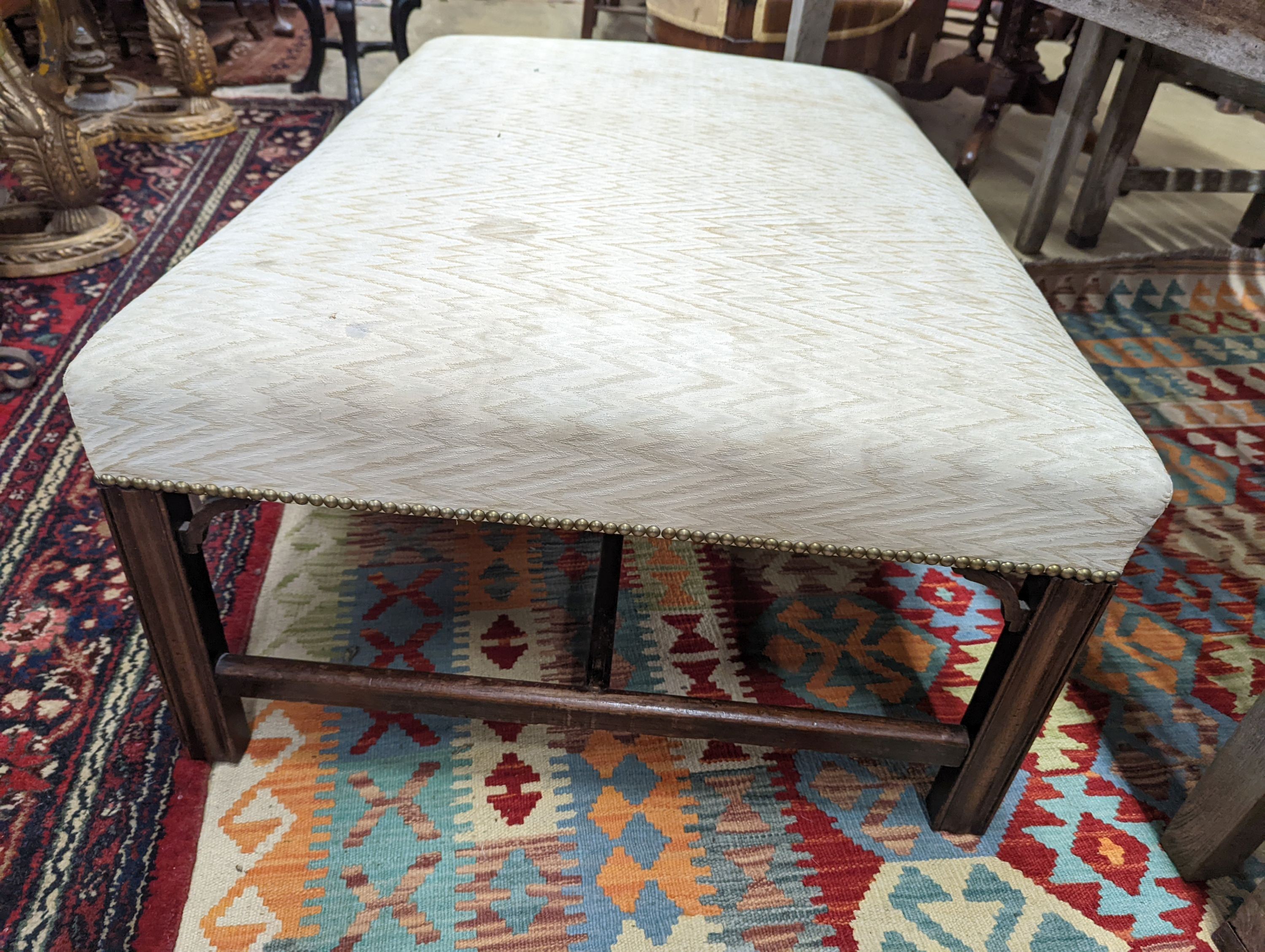 A George III style rectangular upholstered footstool, width 103cm, depth 72cm, height 41cm